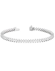 14KT White Gold Beautiful Diamond Tennis Bracelet featuring 59 Round Brilliant Cut Diamonds set into a Double Prong High Polished Setting. 5 3/4 CTW