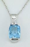 14K Cushion Cut Blue Topaz and Diamond Pendant.