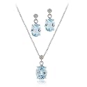 Sterling Silver 10.80 TCW Oval Blue Topaz and Diamond Pendant Earring Set