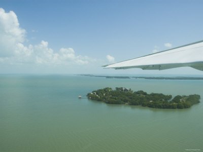 Aerial View of Caribean Sea and Islands with Plane Wing in Sight, Belize Premium Photographic Poster Print, 18x24