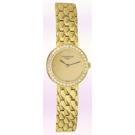 Click here to buy Longines 18K Gold Ladies Honeycomb Watch by Longines.