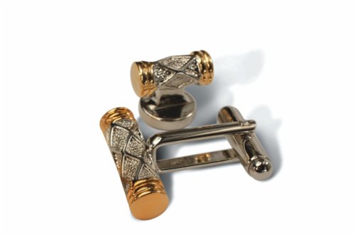 Click here to buy Geoffrey Beene Silver Barrel Diamond Pattern with Gold Edges Cufflink and Stud set.