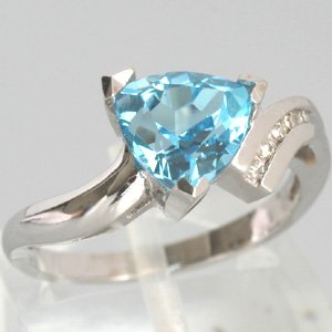 An Estate 14K White Gold Blue Topaz and Diamond Ring by 