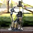 Iron statuette, 'Rustic Dentist'