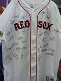 Signed Red Sox, Boston (2007 World Series Champions) 2007 Boston Red Sox World Series Jersey by the Team. 29 signatures in all. Has the world series patch on the right side of the sleeve.