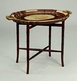 Red tray table with ivory floral design.