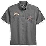 Harley Davidson Men's Short Sleeve Woven with Blade Graphic Shirt--LIMITED EDITION. NEW for 2009. Tough, wrinkle-resistant cotton/poly blend short-sleeve shirt with button front and two button chest pockets. Embroidered patches on left pocket and over right pocket. Printed graphics on sleeves. Printed and embroidered Harley-Davidson graphics on back. 96008-09VM-Pewter; 96007-09VM-Black