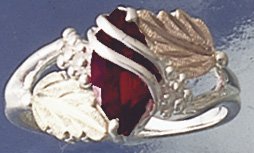 Click here to buy Ladies Landstrom's® Sterling Silver Genuine Garnet Ring by LANDSTROM'S.
