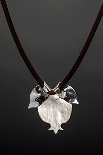 Pomegranate shaped sterling silver pendant on silicone band necklace by Spiral Jewely.