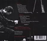 Click for more about Brad Mehldau Trio: Brad Mehldau Trio Live.