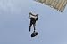 Wallmonkeys Peel and Stick Wall Decals - A Member of the Pathfinder Platoon Prepares to Land from a Parachute Jump. - Removable Graphic