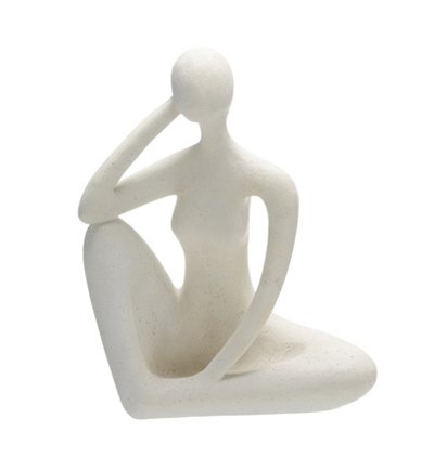 Seated White Figurine