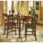 Barrister Butterfly Leaf Counter Height Dinette Set by Ashley Furniture