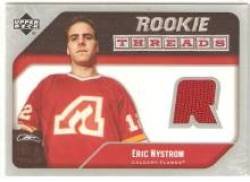 2005-06 Upper Deck Rookie Threads #RTEN Eric Nystrom - Calgary Flames (Piece of Authentic Jersey ) (Hockey Cards)