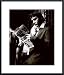All Products : Elvis Reading the Sunday Mirror * by Anon 18.00X24.00 Framed with Black Metal Frame