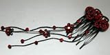 Hair comb with dangling tail