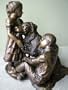 Two Kids with Their Dog Bronze Statue