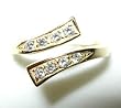 14 karat gold toe ring with clear gemstones