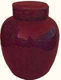 10” high Regal Chinese porcelain radish jar in ox blood red glaze.