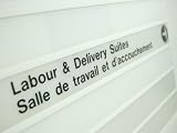Hospital Sign in English and French Pointing to Maternity Ward Photographic Poster Print, 24x18
