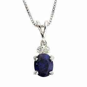 Sterling Silver Oval Simulated Tanzanite CZ with three Simulated Diamond CZ... by 