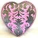 Heart Belt Buckle with Fancy Pewter Design over Bright Pink Background