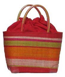 Click here to buy Colorful Straw Handbag Coral.