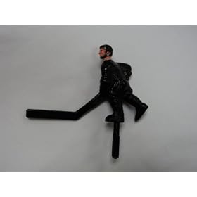 Click here to buy Shelti Black Short Stick Hockey Player.