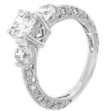 Sterling Silver Filigree Engagement Ring With Round Cubic Zirconia in a Four Prong Setting and Two Sidestones