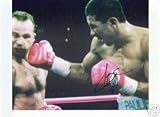 PAULIE AYALA AUTOGRAPHED BOXING PHOTO VS BONES ADAMS FORMER CHAMP (BOXING)