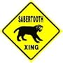 SABERTOOTH CROSSING dinosaur street sign