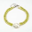 Meg Carter Designs: double strand necklace of lemon jasper rounds, with freshwater pearls and natural white turbo shell. The "Hills Beach" necklace.