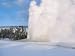 Geyser Erupts High into Air in Winter Photographic Poster Print by Jeff Foott, 24x32