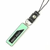 Amazon：携帯　(ミュウミュウ)miu miu ロゴプレート 携帯ストラップ ミントXブラック 並行輸入品