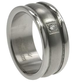 Titanium Ring with cubic zirconia. Combination of matte and shiny polish. Width: 9mm, 9
