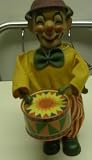 wind up clown playing drum 7 inch russ berrie