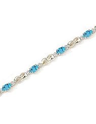 14kt Yellow Gold Oval Blue Topaz and Diamond Bracelet