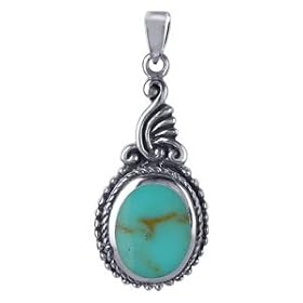 Click here to buy Oval Reconstituted Turquoise Vintage Style Silver 32 MM X 13 MM Pendant Charm by Gem Avenue.