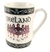 Irish souvenir mug with shamrock and dancing girls design