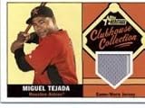 2010 Topps Heritage Clubhouse Collection Relics #MT Miguel Tejada - Houston Astros (Piece of Authentic Game Used Jersey) (Baseball Cards)