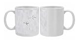 Blackbird Turdus merula footprints in snow in garden Norfolk winter Photo Mugs
