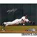 Miguel Tejada Autographed/Hand Signed Baltimore Orioles 8x10 Photo (Diving )