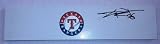 C.J. Wilson Autographed Texas Rangers Logo Pitching Rubber W/PROOF, Picture of CJ Signing For Us, 2010 World Series