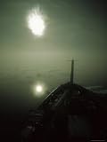 Sun is Filtered Through Haze Above an Arctic Research Vessel Photographic Poster Print by Paul Nicklen, 24x32