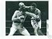 LARRY HOLMES AUTOGRAPHED BOXING PHOTO VS TEX COBB LAST 15RD FIGHT (BOXING)