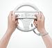 STEERING WHEEL FOR NINTENDO Wii RACING GAMES (including Mario Kart). SLOT IN YOUR REMOTE AND AWAY YOU GO. Part of the XYLO ACCESSORIES RANGE.