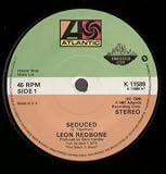 SEDUCED 7" (45) UK ATLANTIC 1981 B/W MAMA`S GOT A BABY NAMED TE NA NA (K11589)