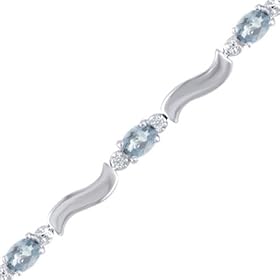 Ladie's Aquamarine and Diamond Bracelet In White Gold by