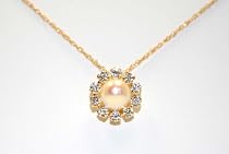 14k Yellow Gold 18" Chain With 10 Stone 8mm White Cubic Zirconia Circle With a 5mm Freshwater Cultured Pearl In the Center
