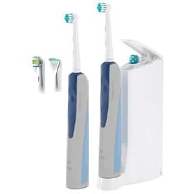 Oral B ProfessionalCare 8875 DLX, two power toothbrush handles.